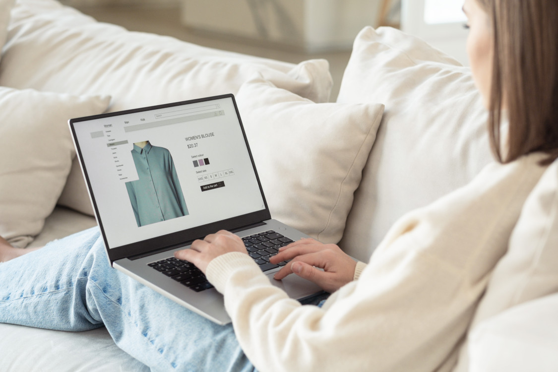 woman using a laptop to shop online