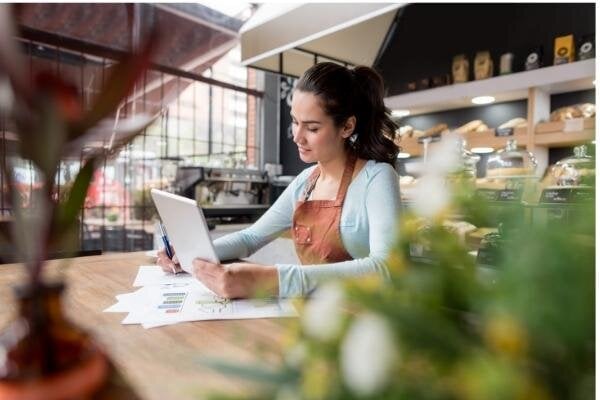 a-beatrice-ne-business-owner-looking-over-her-email-invoicing