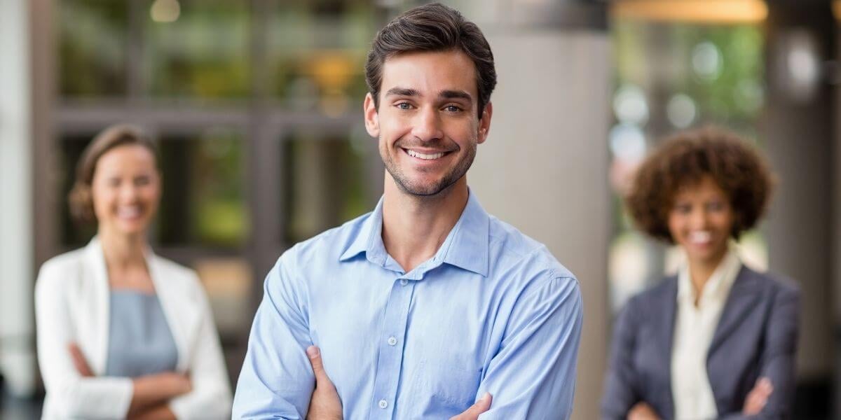 this-leawood-ks-agent-is-standing-with-his-sub-agents-as-he-was-able-to-grow-his-business