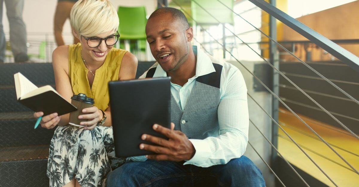 a-merchant-services-reseller-in-oglethorpe-showing-his-merchant-how-to-use-our-mobile-payment-options