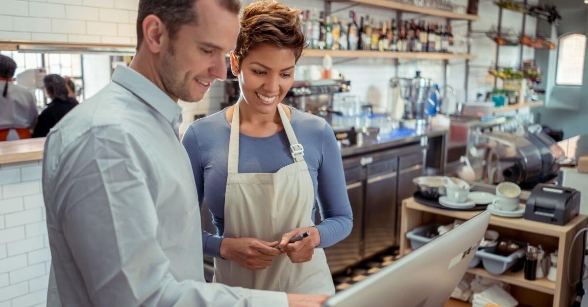 mandan-nd-point-of-sale-dealer-showing-his-client-how-to-use-the-pos-system