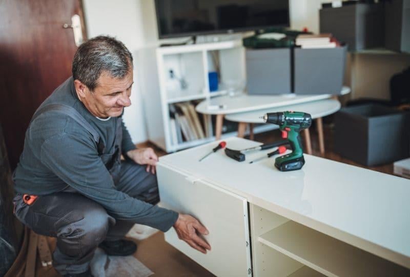 general-contractor-fixing-a-clients-cupboard