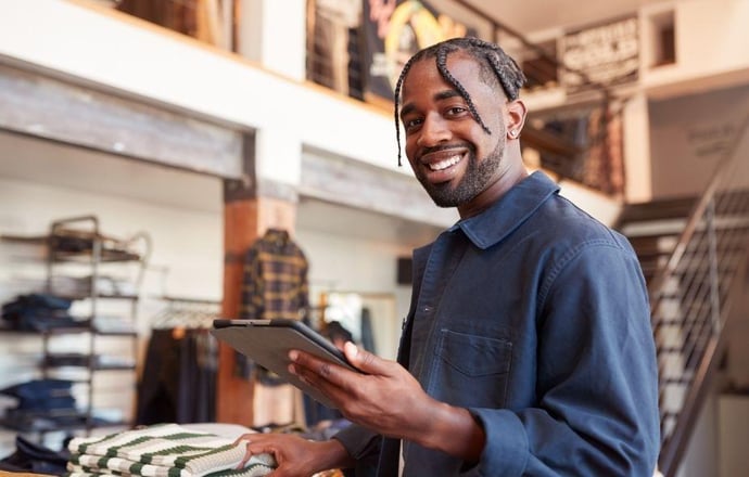 a small business owner at a thrift shop