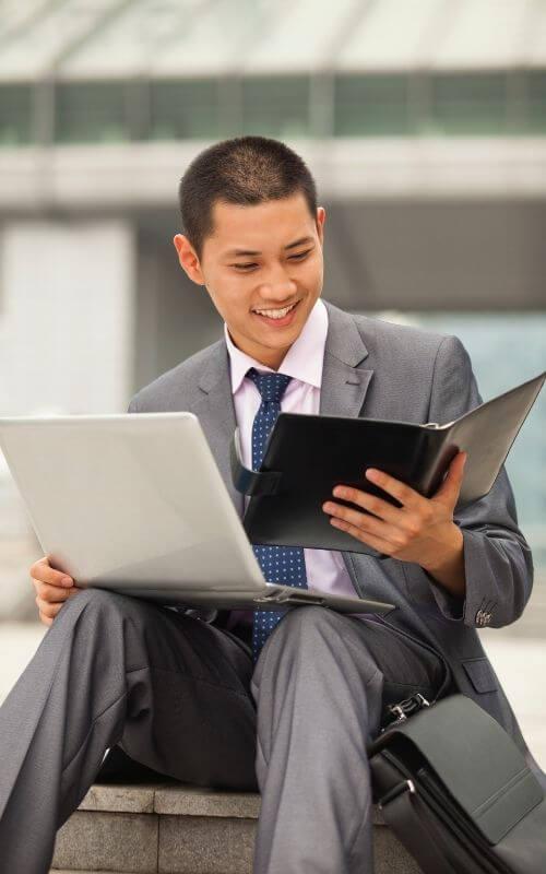 an-iso-agent-is-reviewing-his-growing-merchant-portfolio