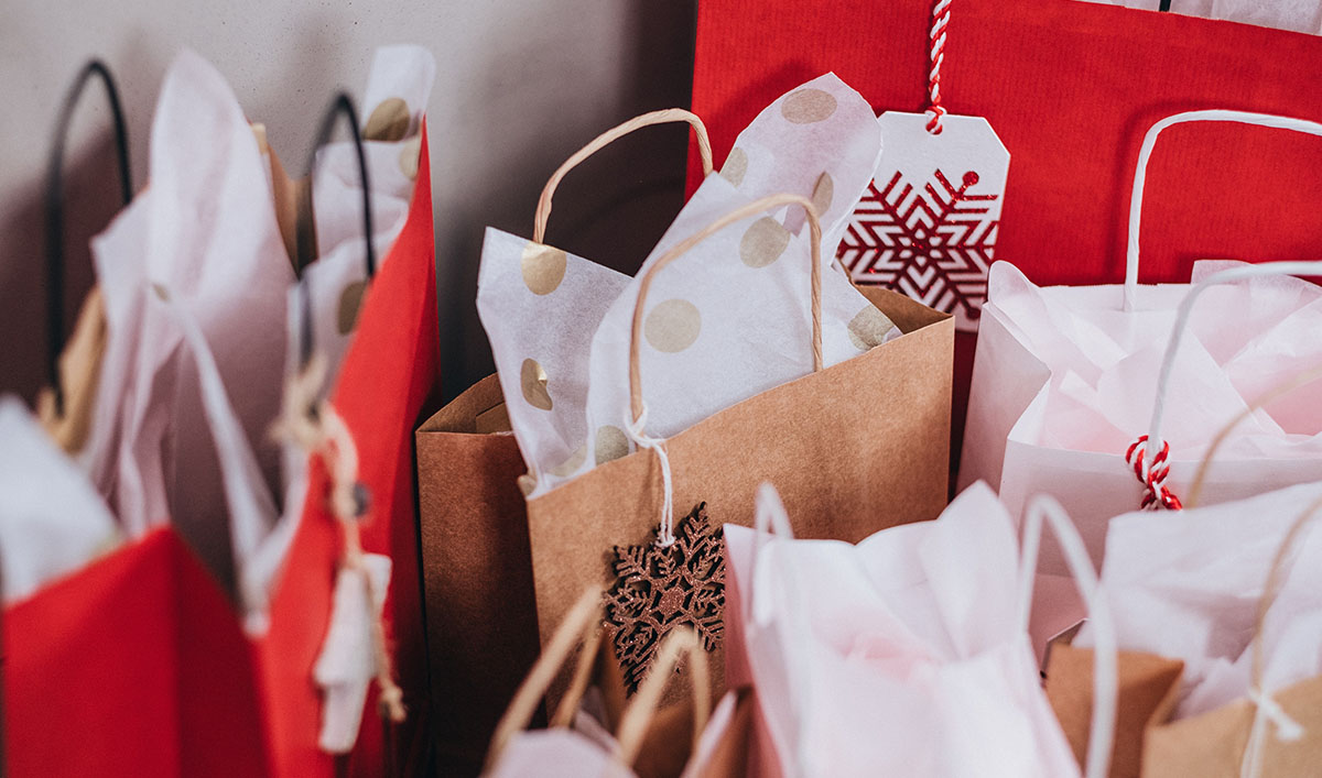 red and gold holiday gift bags