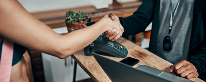 Two business owners shaking hands