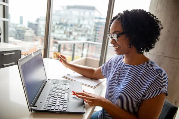 This woman is making a ach payment online. 